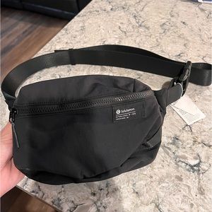 Brand new black Lululemon fanny pack, still has tags on. It’s never been used.